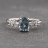 1.44 Carat Blue Oval Montana Sapphire And Diamond Engagement Ring, Phoebe Setting, Platinum