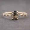 1.34 Carat Black Speckled Oval Diamond Engagement Ring, Nova Setting, 14K Yellow Gold