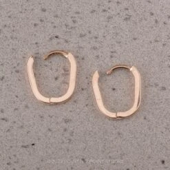 Elongated Oval Huggie Hoops, 14k Rose Gold Earrings 5 Elongated Oval Huggie Hoops, 14k Rose Gold Earrings -Point No Point Studio Store BOXEARRING 2